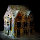 Illustration for article titled Mold-covered model buildings imagine a ghostly end of the world